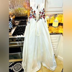 Jovani couture wire multi stones. Shines beautiful. Worn once.made into a corset